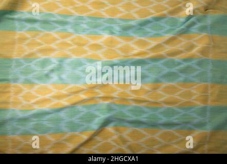 Close up of texture of hand woven cotton cloth, Thai cotton natural color dyed Stock Photo