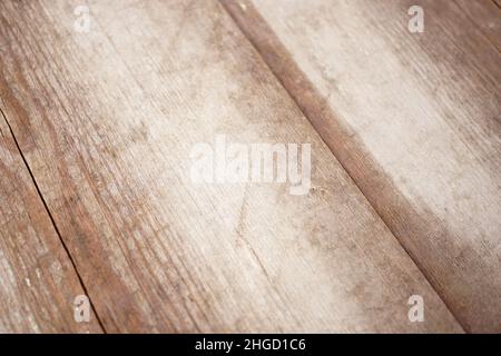 Old rustic weathered wooden background in wet brown Stock Photo