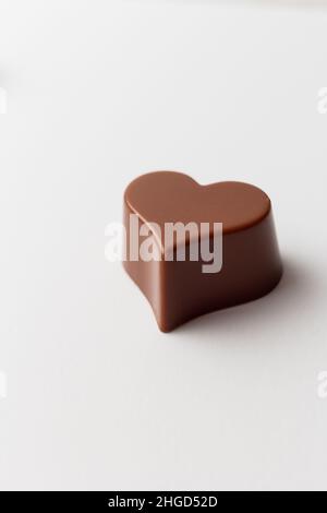 Chocolate heart shape isolated on white background. Stock Photo