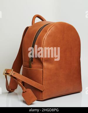 Brown leather backpack isolated on studio background Stock Photo