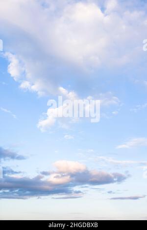 Blue sky with clouds in sunlight. Background or template Stock Photo
