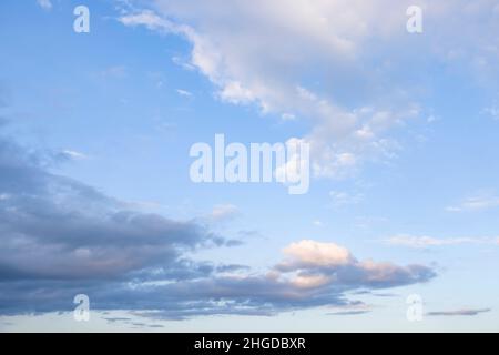 Blue sky with rain clouds in late afternoon. Ideal for a background or template Stock Photo