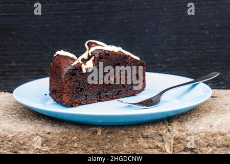 Slice of typical yogurt chocolate cake that looks like brownie, Canary Islands, Spain Stock Photo