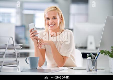 Tackling her work with a can-do attitude Stock Photo