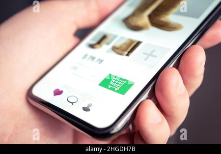 Website for retail shopping. Ecommerce fashion store mobile site. Product price and information online. Customer order and purchase clothes. Stock Photo