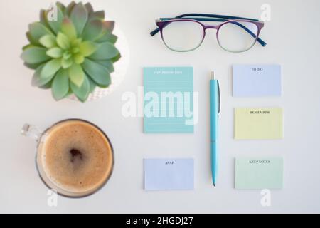 High angle view of a desk with sticky notes on it Stock Photo