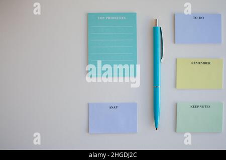 High angle view of a desk with sticky notes on it Stock Photo