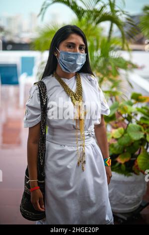 Portrait of young Arhuaco indigenous woman wearing a face mask during the Covid-19 outbreak in Colombia Stock Photo