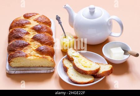 Challah made from yeast dough, a traditional festive dessert bread. Stock Photo