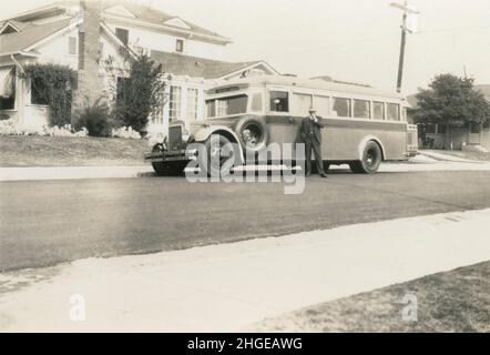 Antique 1931 photograph, private coach at home in Los Angeles, California, United States. SOURCE: ORIGINAL PHOTOGRAPH. See Alamy 2HGEAW9 and 2HGEATK for more views of this bus. Stock Photo
