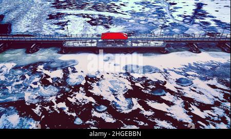 Elevated view of the trestle (friendship) trail in winter. The trail goes across the lake from one city to another. The water is frozen over with snow Stock Photo