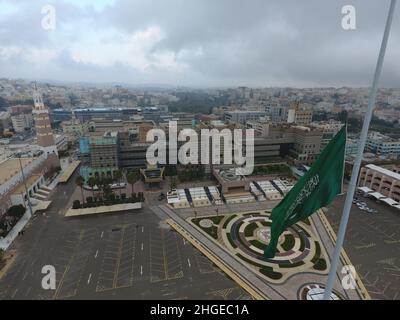 A drone shot for Abha City in Saudi Arabia with Saudi flag Stock Photo