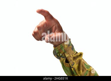 Cropped shot of an unrecognizable soldier hand pointing or pushing with forefinger on a white isolated background Stock Photo