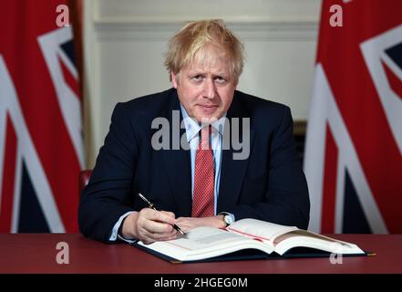 Boris Johnson signs the Brexit Withdrawal Agreement - 24th January 2020 Stock Photo
