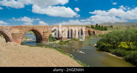 Historic stone Cobandede Bridge. The historical bridge over the Aras River.Turkey's most important historical stone bridges. Koprukoy district