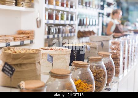 Illustration of showcase with dried fruits and nuts in bag Stock Photo