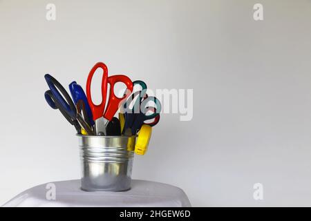 Hobby kit. Scissors and hobby supplies on a white background. Selective focus. Stock Photo