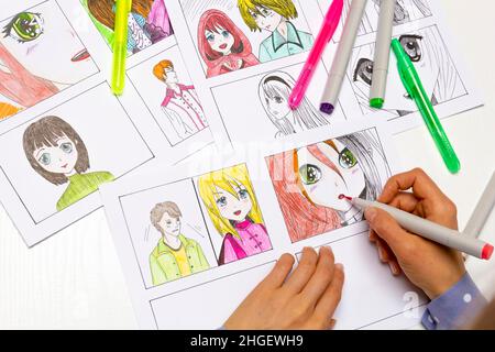 The Artist Draws Anime Comics On Paper Storyboard For The Cartoon The  Illustrator Creates Sketches For The Book Stock Photo - Download Image Now  - iStock