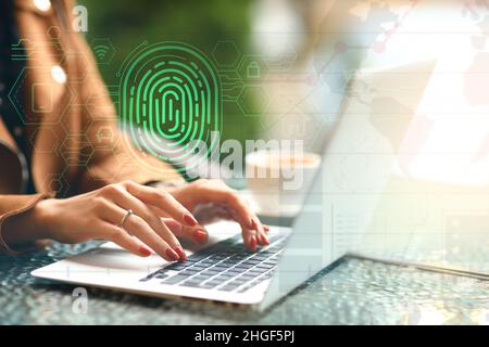 Young businesswoman logging into electronic personal account in office Stock Photo