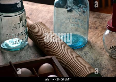 Retro Glass Jars, Rolling Pin on Old Wooden Table