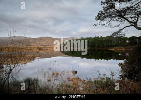 Glenveagh National Park, Co. Donegal. view of lake between mountains. Mountain scene with cloudy sky. Stock Photo