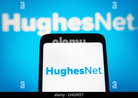Ukraine. 20th Jan, 2022. In this photo illustration, a HughesNet logo is seen on a smartphone and a computer screen. Credit: SOPA Images Limited/Alamy Live News Stock Photo