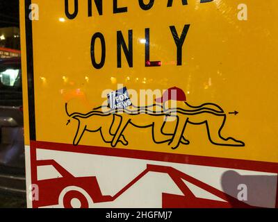 Seattle, USA. 6 Dec, 2020. Trump, Fox News and Red Hat Human Centipede sticker across the street from the SPD East Precinct. Stock Photo