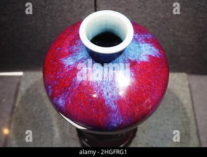 HANGZHOU, CHINA - JANUARY 19, 2022 - Photo taken on Jan. 19, 2022 shows a glazed plum vase from Yongzheng Kiln in The Qing Dynasty at an auction previ Stock Photo