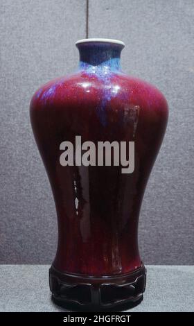 HANGZHOU, CHINA - JANUARY 19, 2022 - Photo taken on Jan. 19, 2022 shows a glazed plum vase from Yongzheng Kiln in The Qing Dynasty at an auction previ Stock Photo