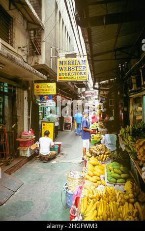 A streetscene on the narrow and colourful Carvajal Street in Binondo, the Chinatown district of Manila in the Philippines. Situated off Quintin Paredes Road, the bustling and high-density Carvajal Street leads through Binondo up to Tomas Pinpin and Yuchengco Streets. Stock Photo