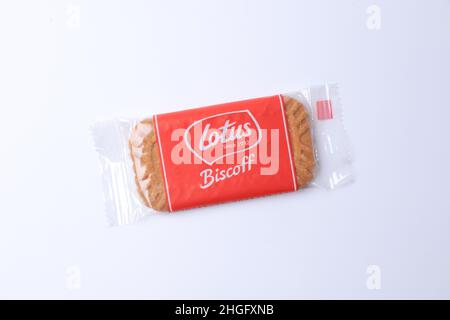 SIDOARJO - EAST JAVA, January 16, 2022: Lotus Biscoff is a caramelized biscuit, smooth and crunchy textures on white background. Copy space. Stock Photo