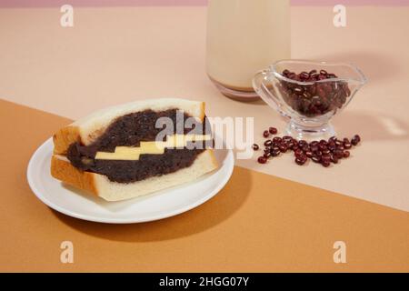 korean traditional dessert, red bean butter bread, latte Stock Photo