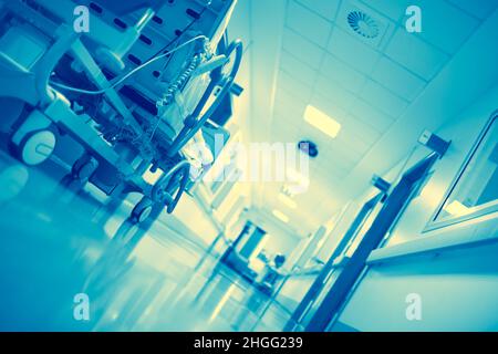 Hospital building lobby with modern gurney, medical background. Stock Photo