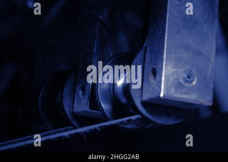 Pulley with belt as a piece of industrial machine. Stock Photo