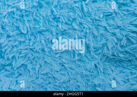 Beautiful sparkling artificial blue fur texture background Stock Photo