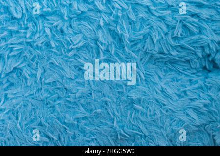 Beautiful sparkling artificial blue fur texture background Stock Photo