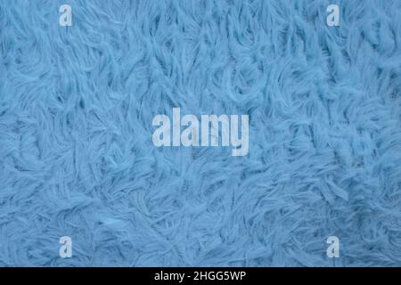 Beautiful sparkling artificial blue fur texture background Stock Photo