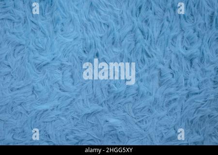 Beautiful sparkling artificial blue fur texture background Stock Photo