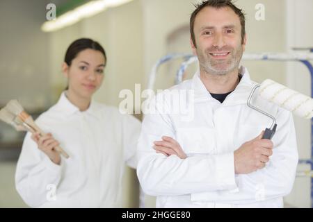 young apprentice painter in professional training Stock Photo