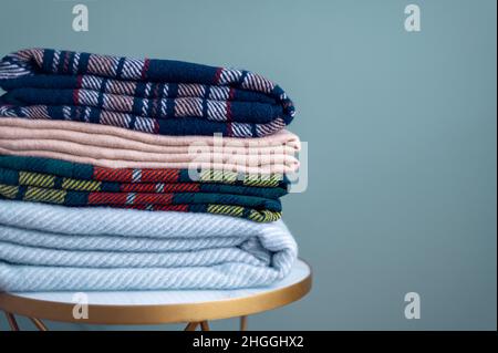 Stack of woolen checked blankets Stock Photo