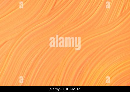 Abstract fluid art background orange and coral colors. Liquid marble. Acrylic painting on canvas with peach gradient. Watercolor backdrop with wavy pa Stock Photo