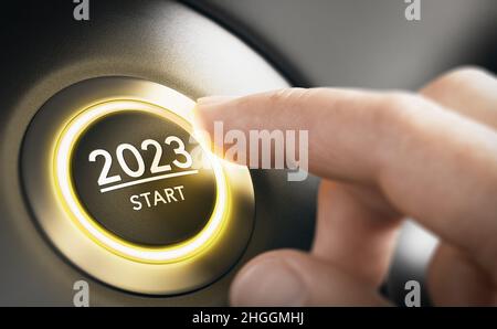 Finger about to press a car ignition button with the text 2023 start. Year two thousand and twenty three concept. Composite image between a hand photo Stock Photo