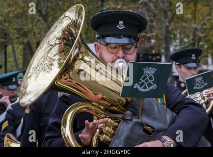 Closeup of man playing a tuba with The Band of The Royal Yeomanry (Inns Of Court & City Yeomanry) marching in the Lord Mayor's Show 2021, London. Stock Photo