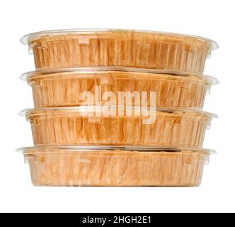 Stacked quiches in a studio setting, isolated on white. Stock Photo