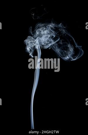 White smoke on black background. Close-up smoke on dark background. Stock Photo