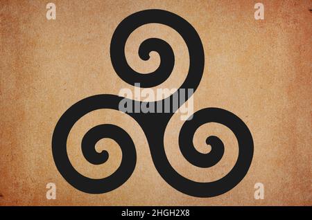 Triskel amulet ancient strong scandinavian and celtic mythical rune on grunge background Stock Photo