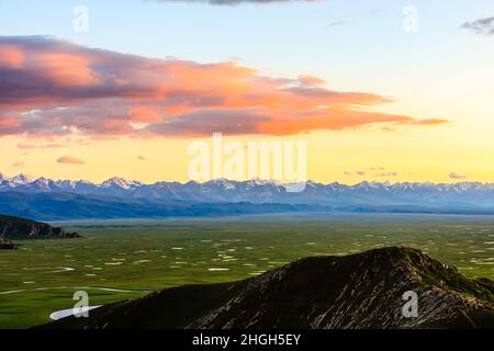 Bayinbuluke grassland natural scenery in Xinjiang at sunset,China. Stock Photo