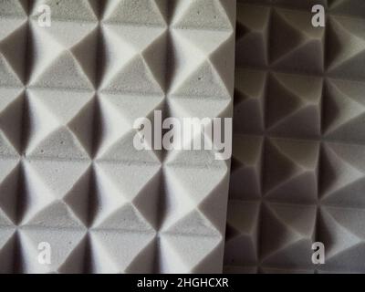 Plates of gray soundproof foam rubber. Sound-absorbing material. Stock Photo