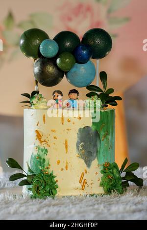 Birthday cake arrangement on table Stock Photo