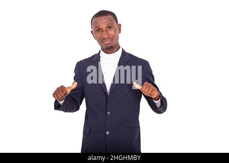 handsome happy adult businessman pointing thumbs up on himself. Stock Photo